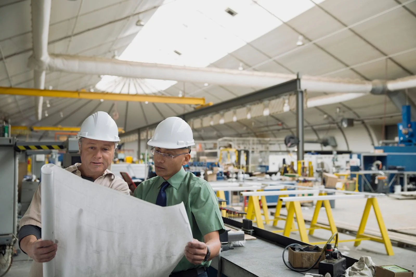 Engineers working on drawings